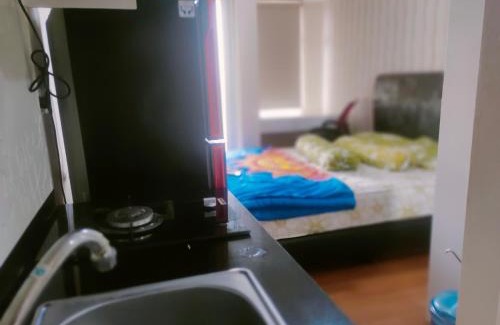 Bekasi Apartment | Oceanfront Sunset View Studio with Free WiFi & Pool Access