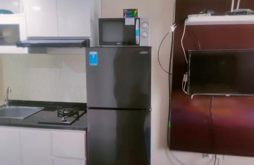 Bekasi Apartment | Oceanfront Sunset View Studio with Free WiFi & Pool Access