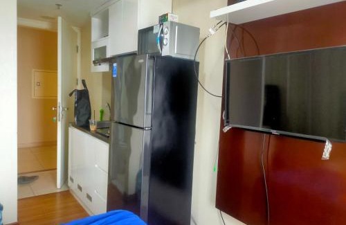 Bekasi Apartment | Oceanfront Sunset View Studio with Free WiFi & Pool Access
