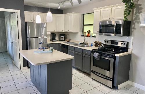 Cooper City House | Bright Sunshine Acre King Master Suite with Big Yard