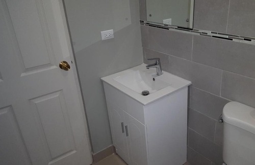 Caribbean Estates Apartment | Convenient Sunshine Country Club 1 Bedroom - Book Today!