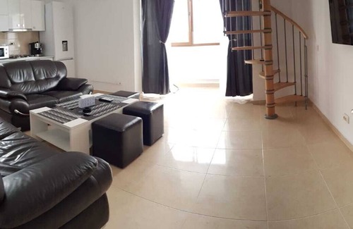Mamaia-Sat Apartment | Family-Friendly Sunshine Residence with Kitchen & Accessibility