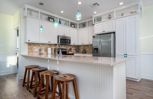 Rockport House | Waterfront Sunshine Retreat with Heated Pool & Fishing Pier