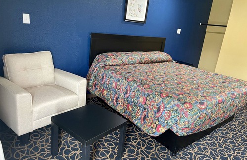 Carencro Hotel | Budget-Friendly Super 6 Inn with Breakfast & Family Amenities