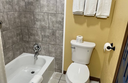 Carencro Hotel | Budget-Friendly Super 6 Inn with Breakfast & Family Amenities