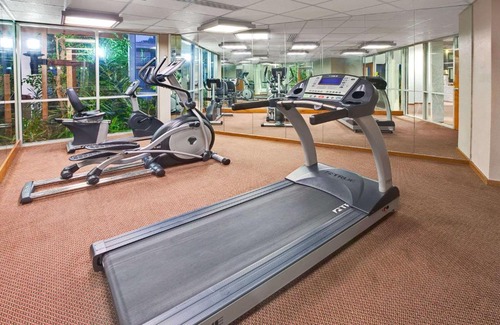 Norman Hotel | Cozy Stay at Super 8 by Wyndham Norman with Pool & Pets