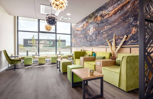 Oberhausen Hotel | Discover Super 8 by Wyndham Oberhausen: Eco-Friendly Comfort