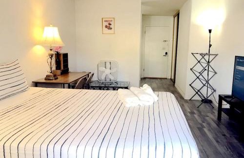 Spring Valley House | Cozy Bedroom with Private Bathroom for a Relaxing Stay
