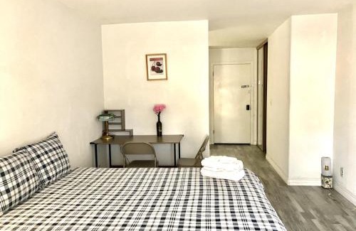 Spring Valley House | Cozy Bedroom with Private Bathroom for a Relaxing Stay