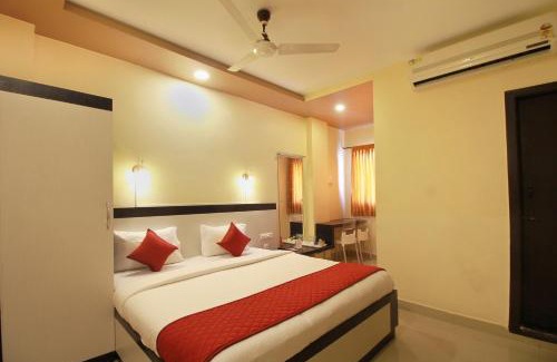 RS Puram Hotel | Budget-Friendly Hotel Rj Grand: Family Welcome Awaits
