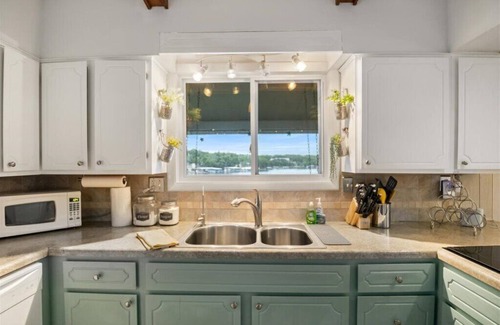 Lake Ozark House | Inviting Retreat with Private Dock & Outdoor Bar Area