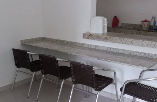 Praia Grande Apartment | Ideal Getaway with Pool and Kitchen Near Grand Praia