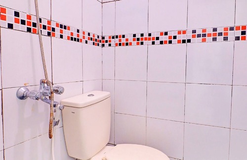 Buduk Hotel | Budget-Friendly Stay at SUPER OYO 1356 Gusti Residence