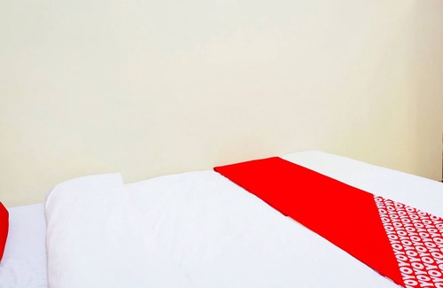 Malang Hotel | Budget-Friendly Stay at Super OYO Flagship Berlima Guest House