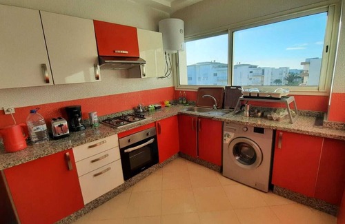 El Mansouria Apartment | Inviting Apartment with Pool Access in Prime Residence