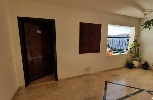 El Mansouria Apartment | Inviting Apartment with Pool Access in Prime Residence