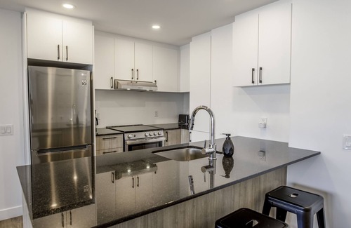 Saint-Jean-Baptiste Apartment | Modern Condo with Pool in Downtown Quebec City - 9.6/10 Rated