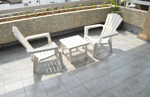 Douala Apartment | Elegant Studio with Pool in Premier Building, Rated 9.5/10