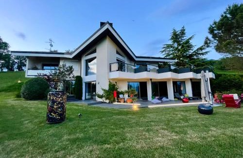 Lucinges Villa | Elegant Villa with Indoor Pool, Spa & Oceanfront Views