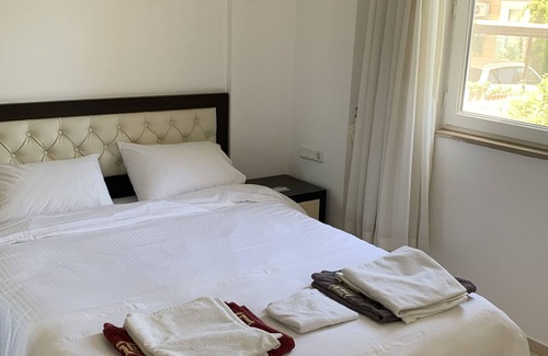 Fethiye City Center Apartment | Beachfront 3 Bed Duplex with Ocean Views & Pool Access