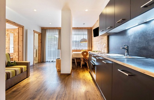 Gudon Apartment | Top-Rated Marialisa Apt Orchidee with Mountain View & Hot Tub