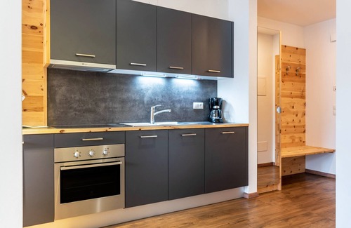 Gudon Apartment | Top-Rated Marialisa Apt Orchidee with Mountain View & Hot Tub