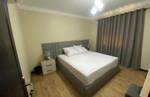 Heliopolis Apartment | Modern Ocean Blue Suites with Pool & Child-Friendly Amenities