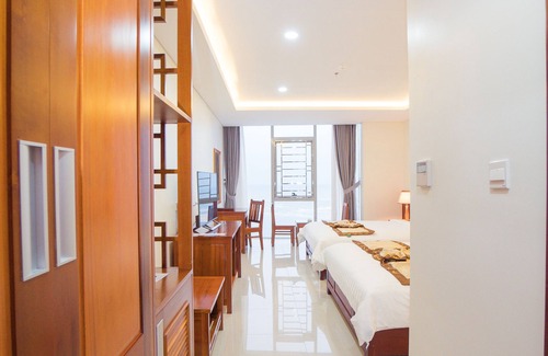 Dong Hoi Hotel | Welcoming Triple Room with Pool Access in 4-Star Hotel