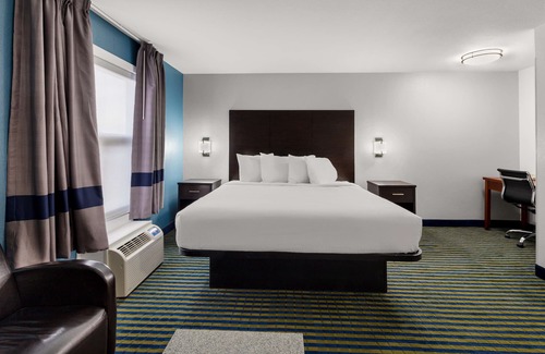 Brooks Hotel | Guest Rated 9.2: SureStay Plus by Best Western Brooks