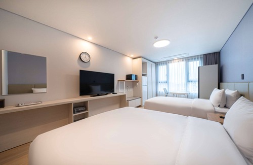 Asan Hotel | Explore SureStay Plus Hotel By Best Western Asan Today