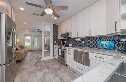 Butler Beach House | Inviting Getaway: Private Pool & Oceanview Rooftop Deck