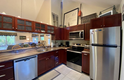 Brewster Condo | Exquisite Ocean Edge Patio Home with Pool Access & A/C