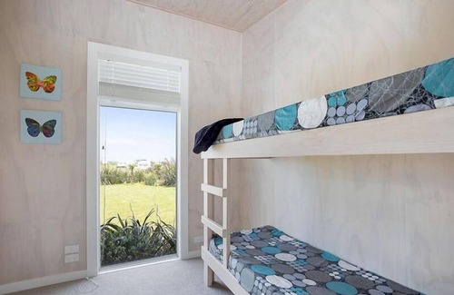 Colac Bay House | Oceanfront Beach Bach with Stunning Views & Family Amenities