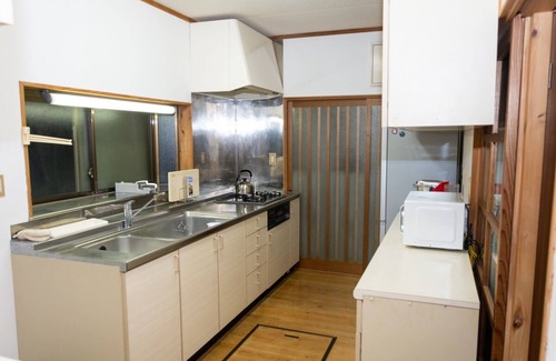 Nishina House | Surfs up! Beautiful Beach House with Onsen, in Nishiizu.