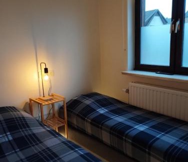 Helchteren Apartment | Family-Friendly Retreat in Three Bedrooms for Your Getaway