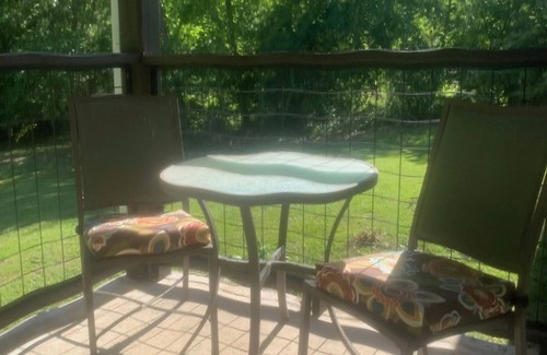 Landrum House | Surrounded by sweetgum and maple trees, this house is perfect for some R & R.