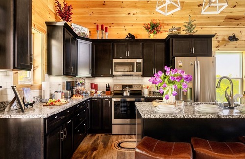 Chalet Village North Cabin | Discover Susie's Nest: A Mountain Cabin with Pool & Spa