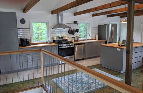 Dauphin House | Riverside Retreat with Ocean View & Perfect Guest Rating