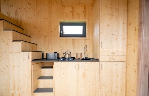 Harlesiel House | Eco-Friendly Retreat in the Green Tiny House by the Sea