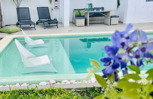 Santa Luzia Villa | Experience Bliss at Susy’s Garden: Oceanfront & Pet Friendly