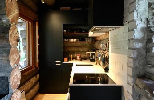 Rovaniemi Ski Chalet | Suvantokoto Riverside Log Cabin