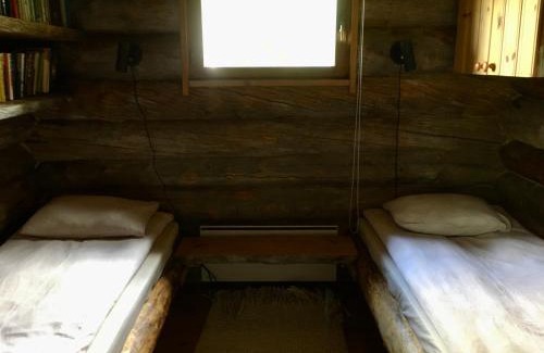 Rovaniemi Ski Chalet | Suvantokoto Riverside Log Cabin