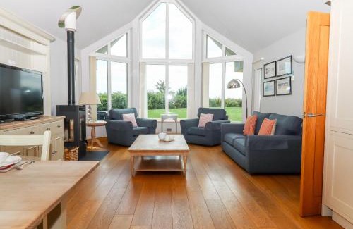Eleighwater House | Discover Swandown: Family-Friendly Retreat with Pool