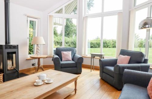 Eleighwater House | Discover Swandown: Family-Friendly Retreat with Pool