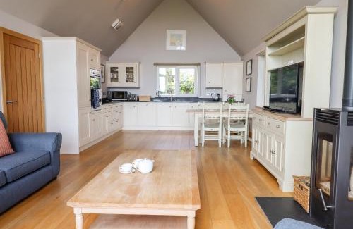 Eleighwater House | Discover Swandown: Family-Friendly Retreat with Pool