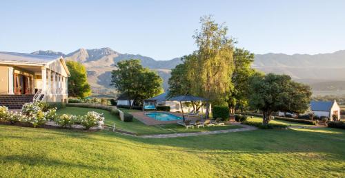 Oudtshoorn House | Discover Swartberg Country Manor: 4-Star Comfort & Pool
