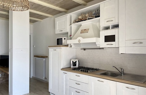 Riva di Solto Apartment | Charming Lavender Apartment with Ocean View & Pool Access