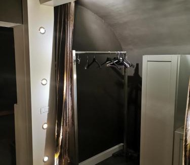 Biella Apartment | Cozy San Filippo: Industry Style in the City Center
