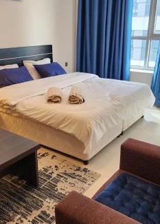 Al Muraqqabat Apartment | Discover Sweethome: Oceanfront Bliss with Relaxing Amenities