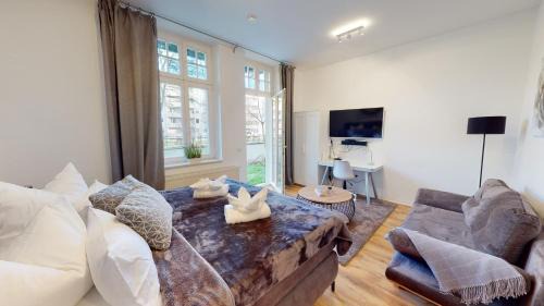 Magdeburg Apartment | SweetHome: Family-Friendly Business Apartment with Terrace